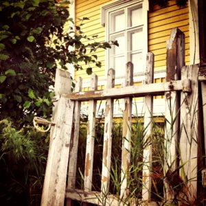 Home and wooden front gate